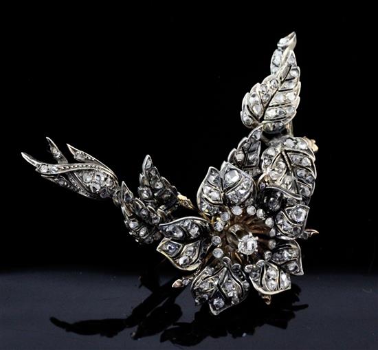 A Victorian gold, silver and diamond trembleuse brooch, 2.25in.